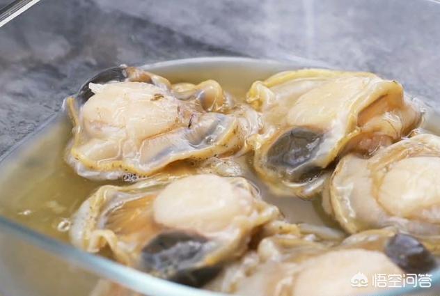扇贝肉的内脏怎么处理，扇贝肉的正确清理（扇贝肉的做法及扇贝处理的方法）