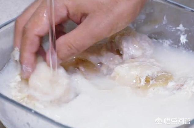 扇贝肉的内脏怎么处理，扇贝肉的正确清理（扇贝肉的做法及扇贝处理的方法）