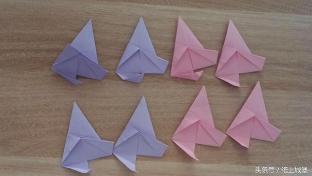 怎么用折星星的纸做其他东西，DIY五角星纸花的方法