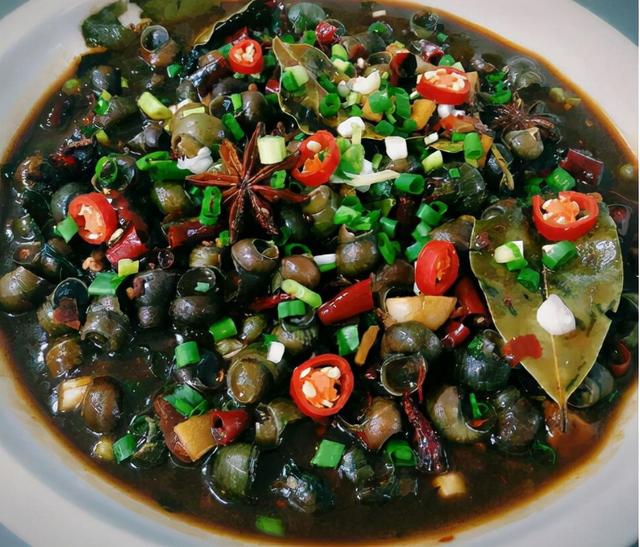 正宗广西炒河螺，师傅使用独门秘方炒田螺