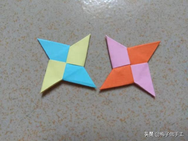 飞镖折纸超简单版一张纸，手工折纸一款像太阳花的飞镖