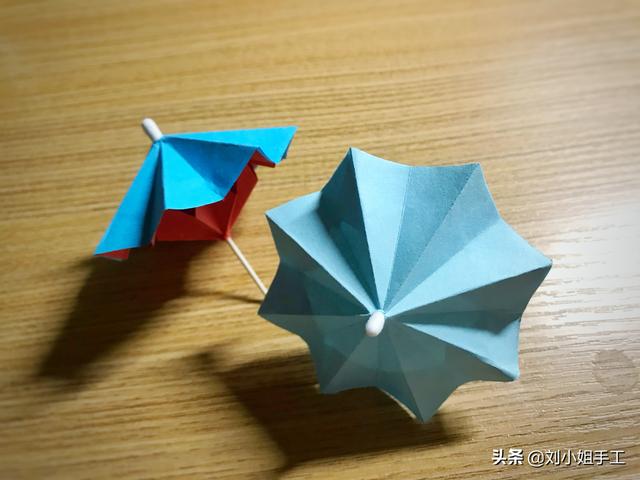 最简单的雨伞折纸方法图解，折纸教程：带爱心的小花伞