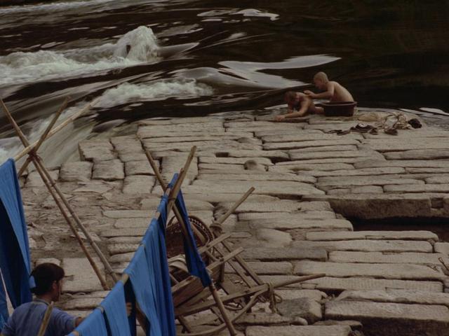 张艺谋的电影风格和特点，作为时代的一块