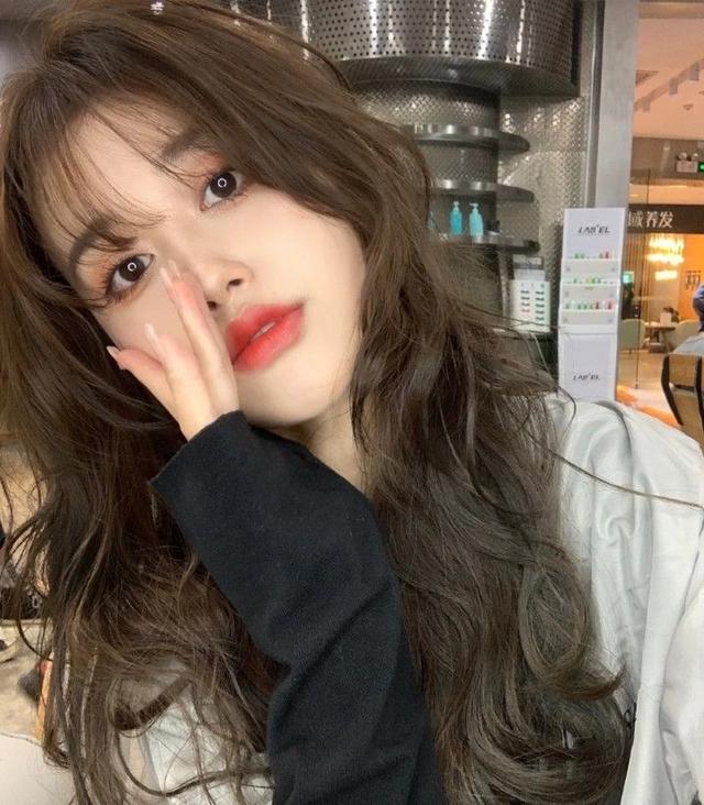 羊毛卷怎么打理，羊毛卷怎么卷好看又显年轻