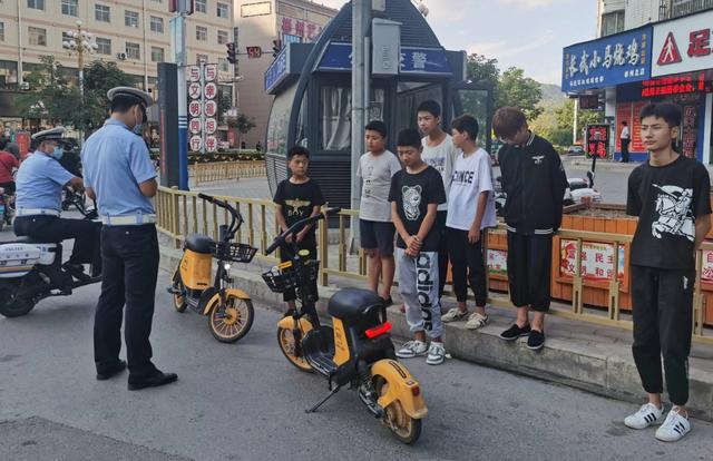 摩托车载人规定，电动自行车电轻摩（电动自行车载人新规定）