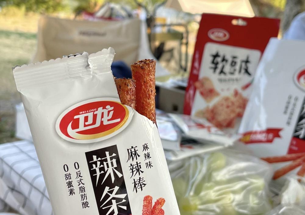 “辣条之王”卫龙流血上市-94美元等于多少人民币