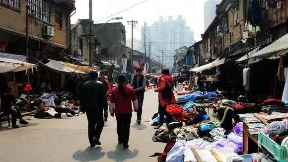 “布料一条街”往事：走俏全球的“上海做工”与跨越语言的友情-上海纺织住宅开发总公司