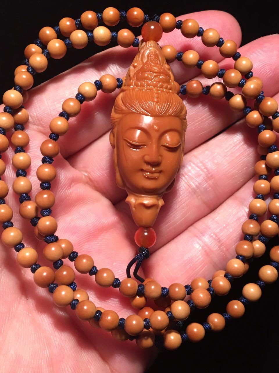 九龙观音寓意和象征，龙观音的寓意（橄榄核雕刻作品中观音菩萨人物的寓意你知道吗）