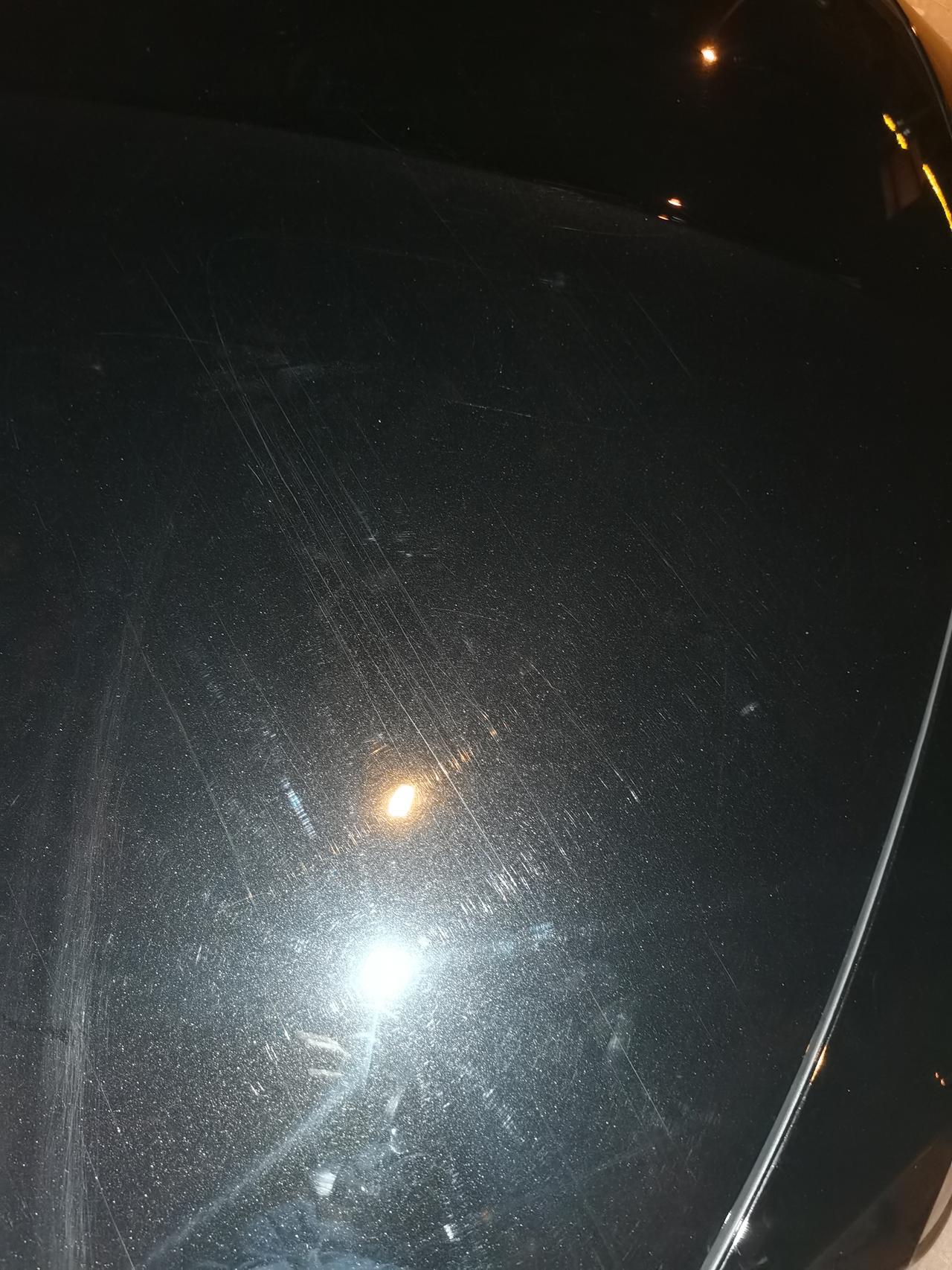 洗车店造成这种的划痕怎么处理