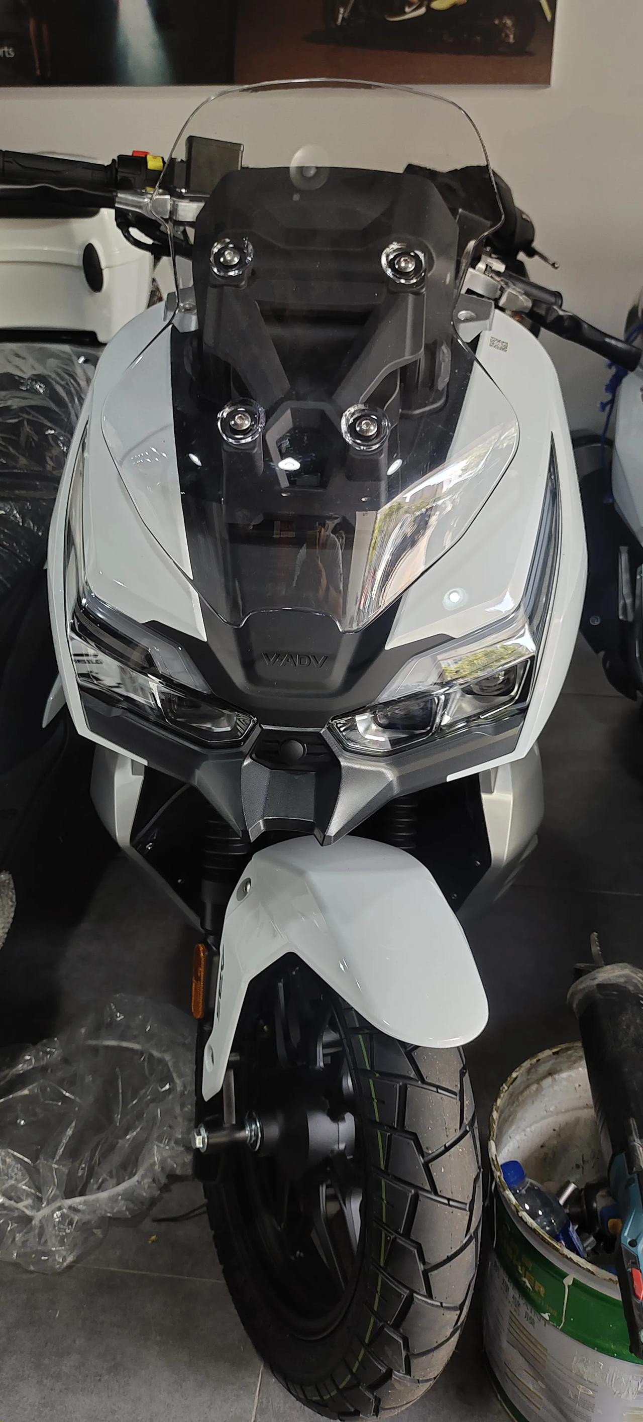 图一#光阳# 弯道情人150  图二#大阳# adv150  图三#三阳# fnx150