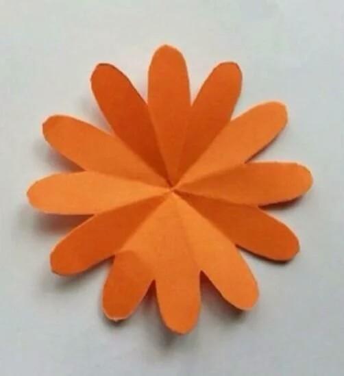 怎样制作手工剪纸菊花，菊花手工剪纸图案大全（剪纸手工制作之多花瓣菊花折纸手工图解）