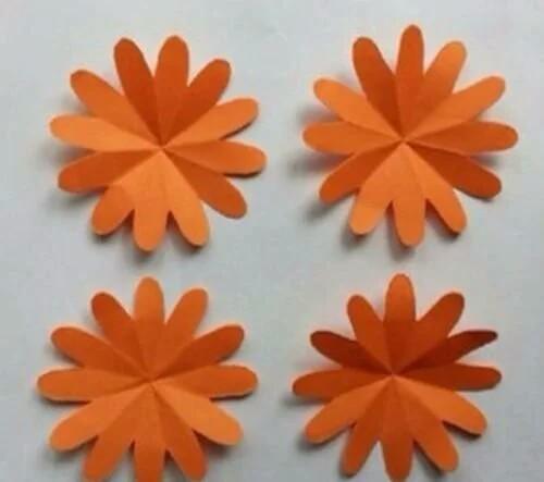 怎样制作手工剪纸菊花，菊花手工剪纸图案大全（剪纸手工制作之多花瓣菊花折纸手工图解）