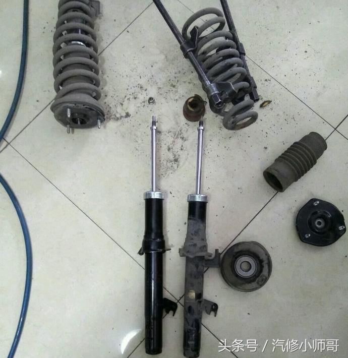 全程简要说明更换减震器全过程