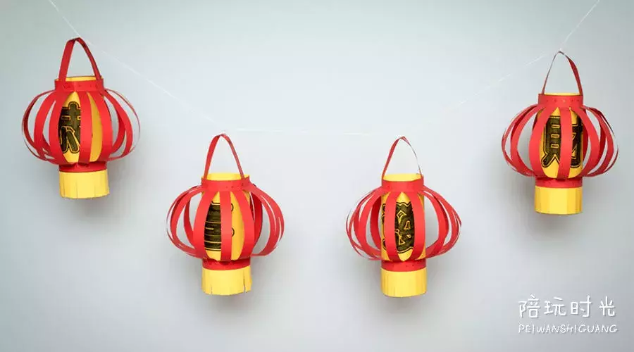 纸灯笼,纸鞭炮,纸龙,今年春节,家里就用孩子的手工来装饰