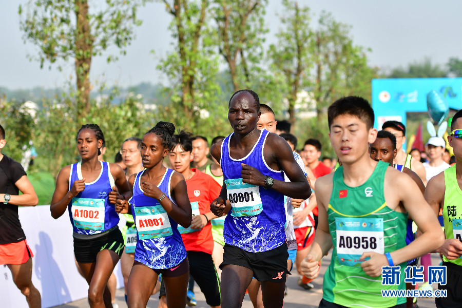 2014射击世界杯(乡约武胜(36)｜武胜乡村马拉松鸣枪起跑，奥运冠军领跑，近五千名选手参赛)