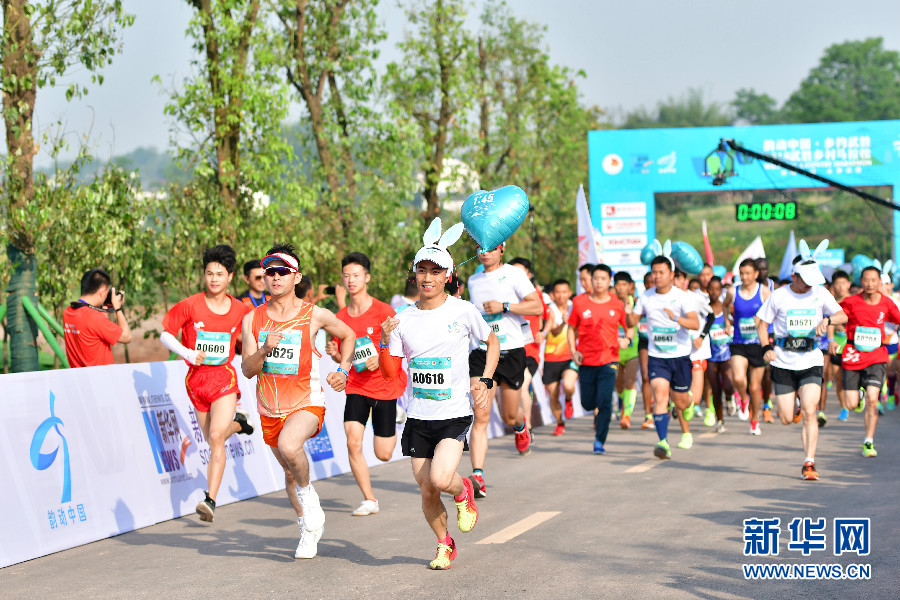 2014射击世界杯(乡约武胜(36)｜武胜乡村马拉松鸣枪起跑，奥运冠军领跑，近五千名选手参赛)