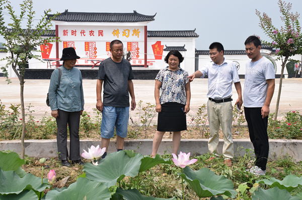 杨健：沉下身子 带着真情为民脱贫