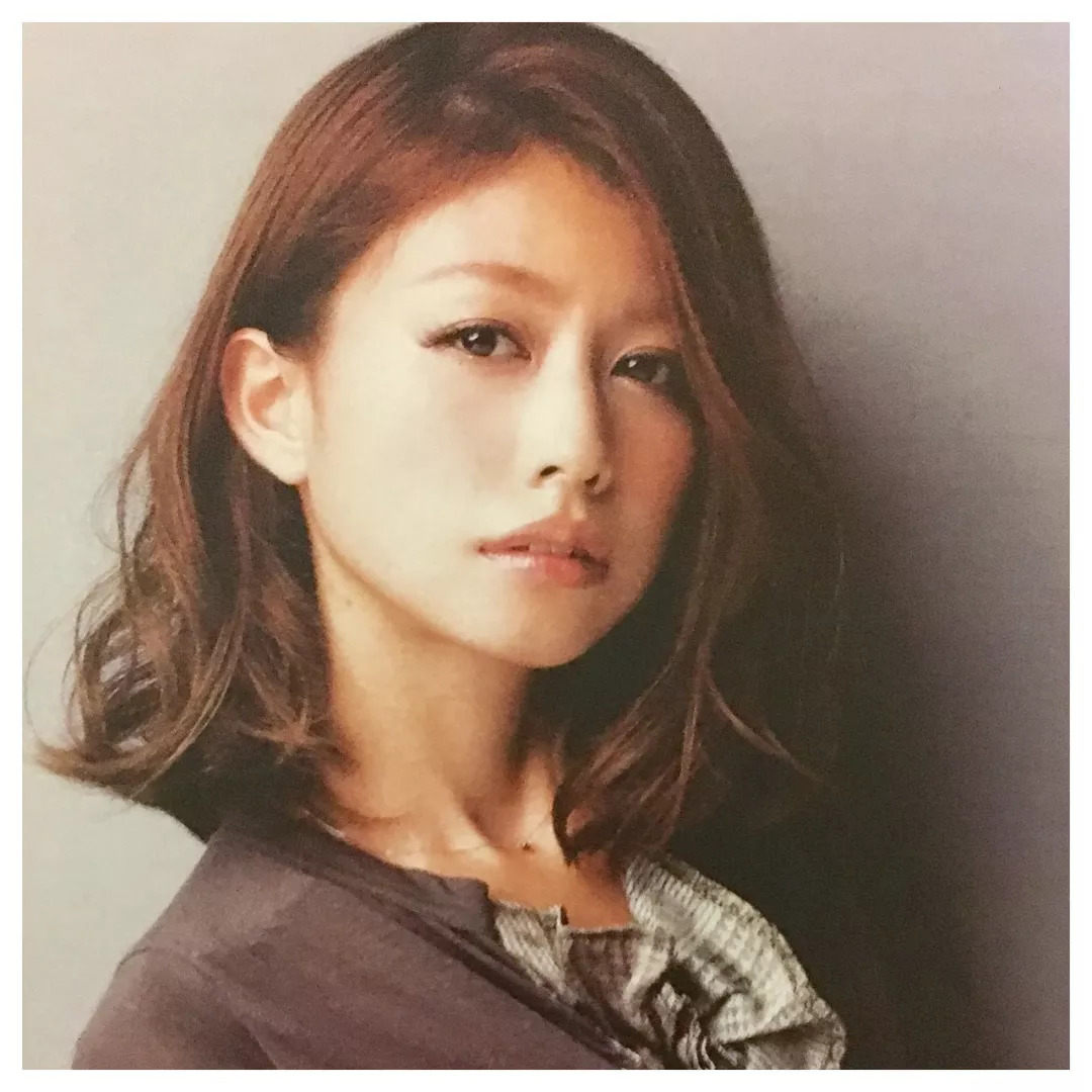 中长发烫发发型图片 女士长发烫发发型图片-经验帮