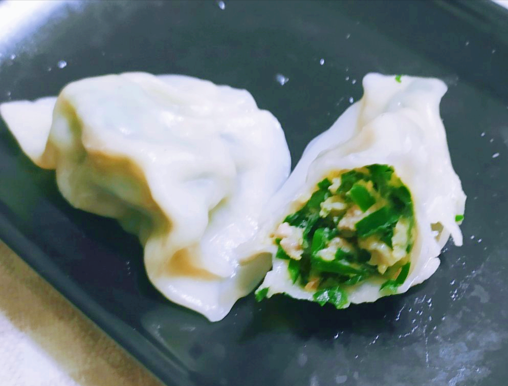 韭菜肉馅饺子怎么调馅(包猪肉韭菜饺子)