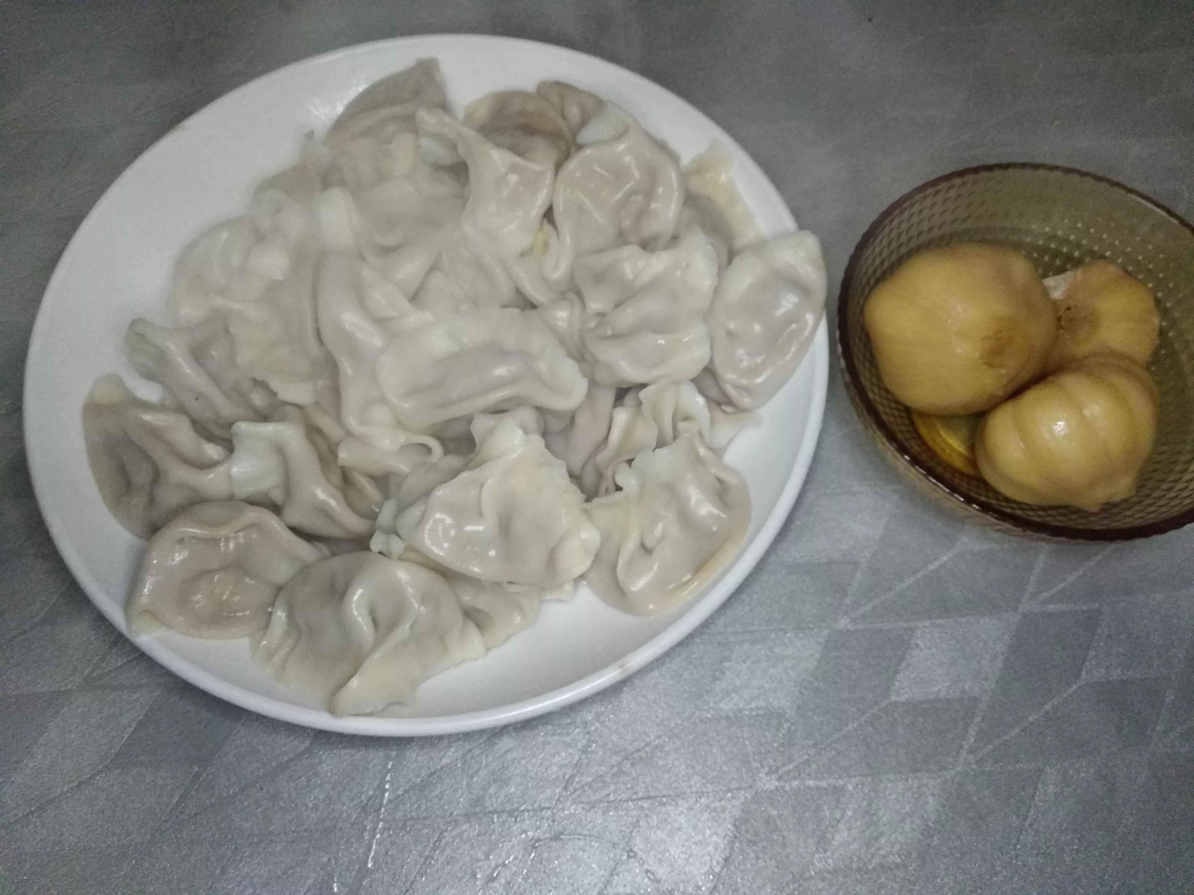 “年三十”，东北人爱吃的酸菜饺子，这么调:酸香解腻，味道鲜