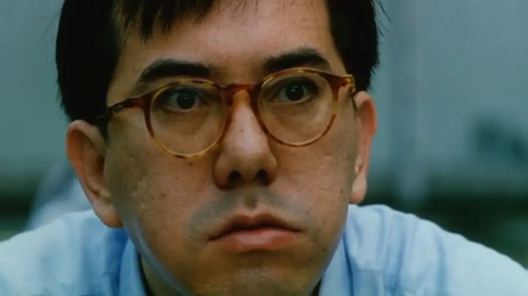 32岁的黄秋生凭借《八仙饭店》中将受害人做成包子的王志恒,为他获得