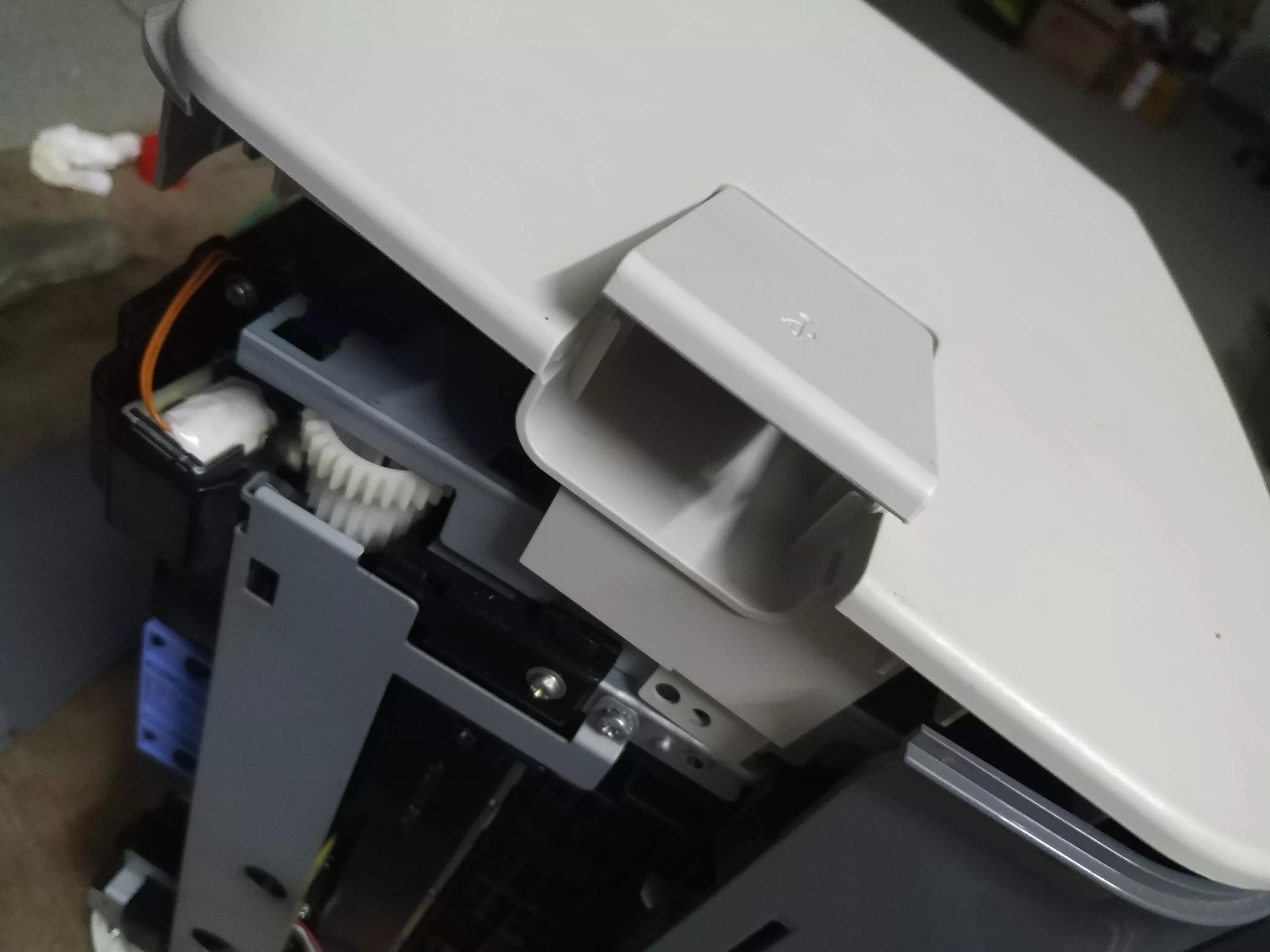 佳能打印机卡纸了怎么把纸拿出来_佳能 卡纸