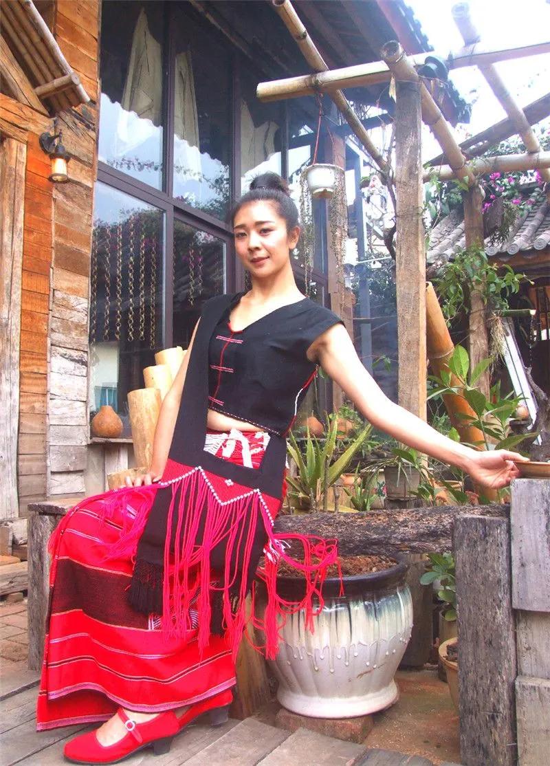 佤族服装图片(独特的佤族服装秀于思茅举行)