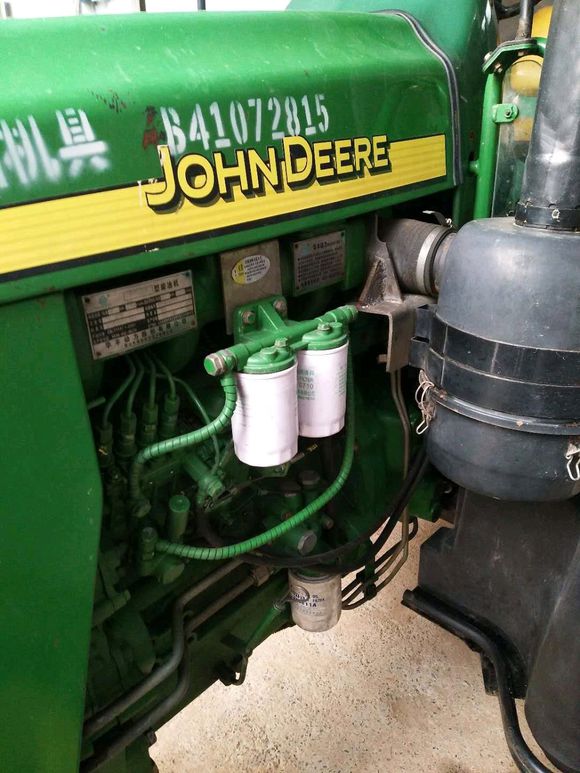 農(nóng)民想買這臺15年的迪爾950拖拉機，工作了時間不長，值多少錢？