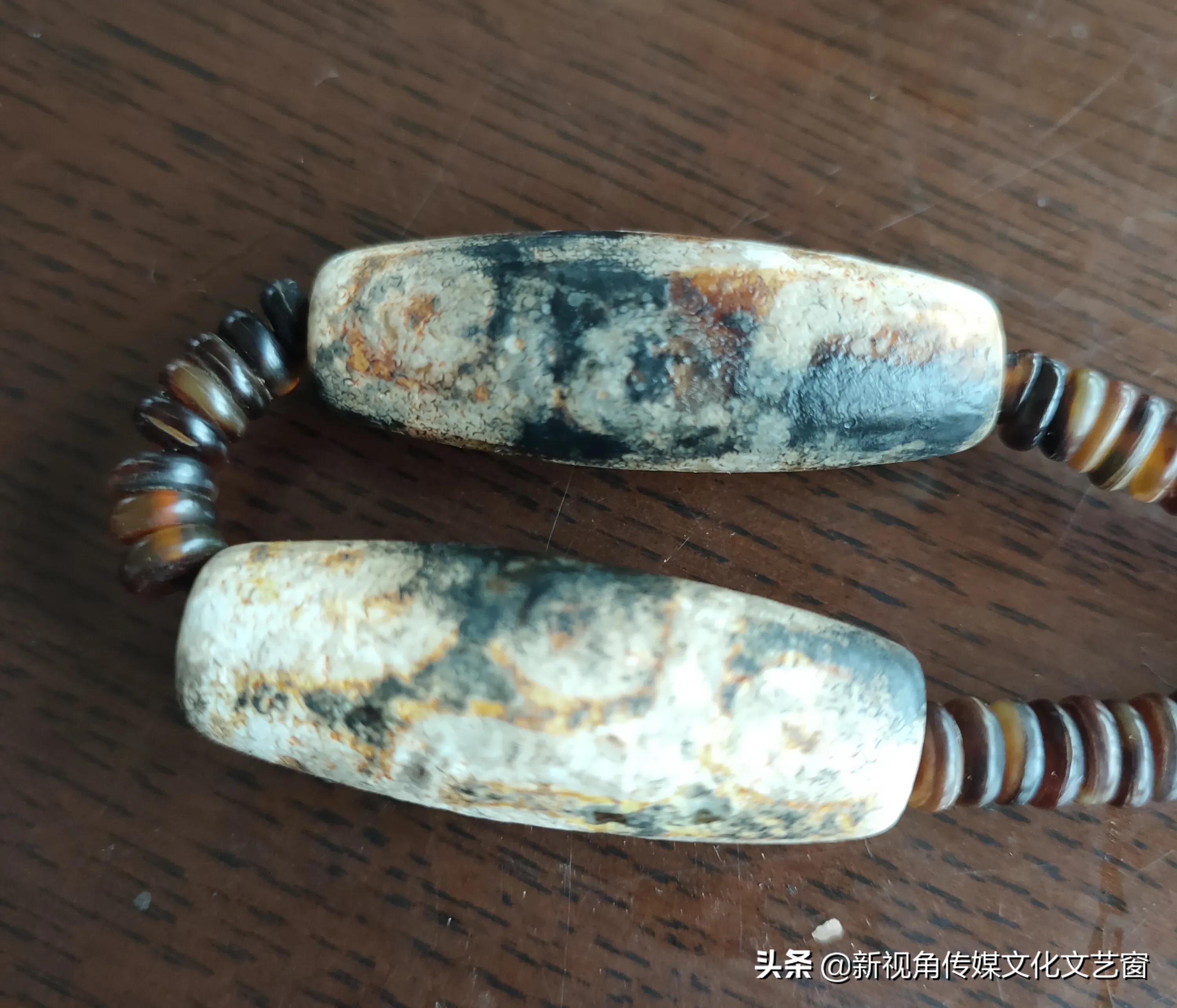 老火供天珠一对(九眼天珠的寓意) 第2张