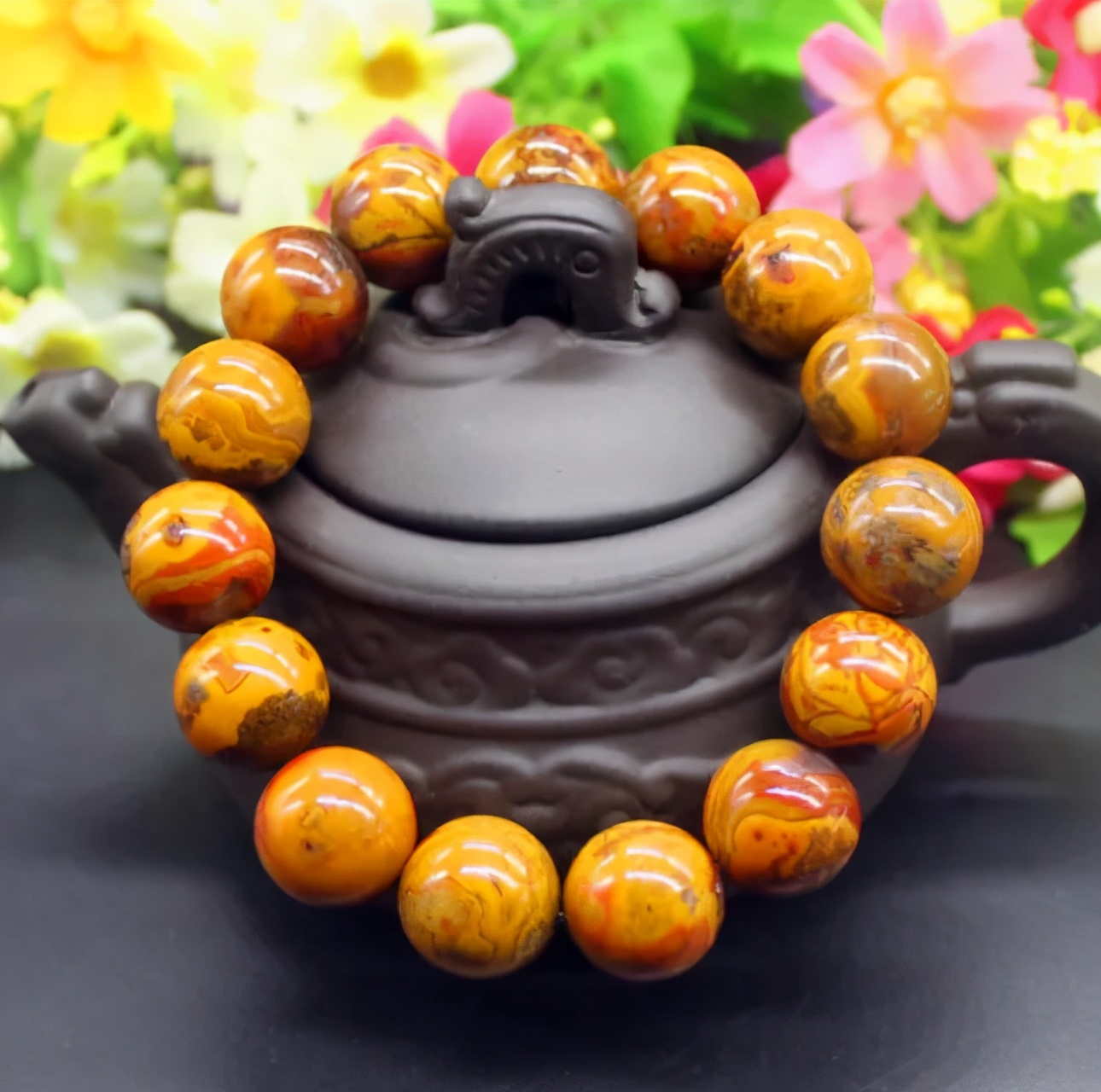 价格的分析,想必大家已经意识到战国红玛瑙手串的市场价值有多高了