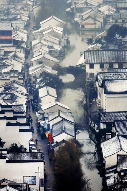 一袭江南梦，醉卧烟雨中！