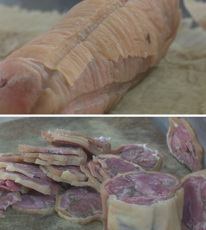 滨海捆蹄切成圆形的薄片放在盘内,色泽红亮,晶莹剔透,小朋友们迫不及