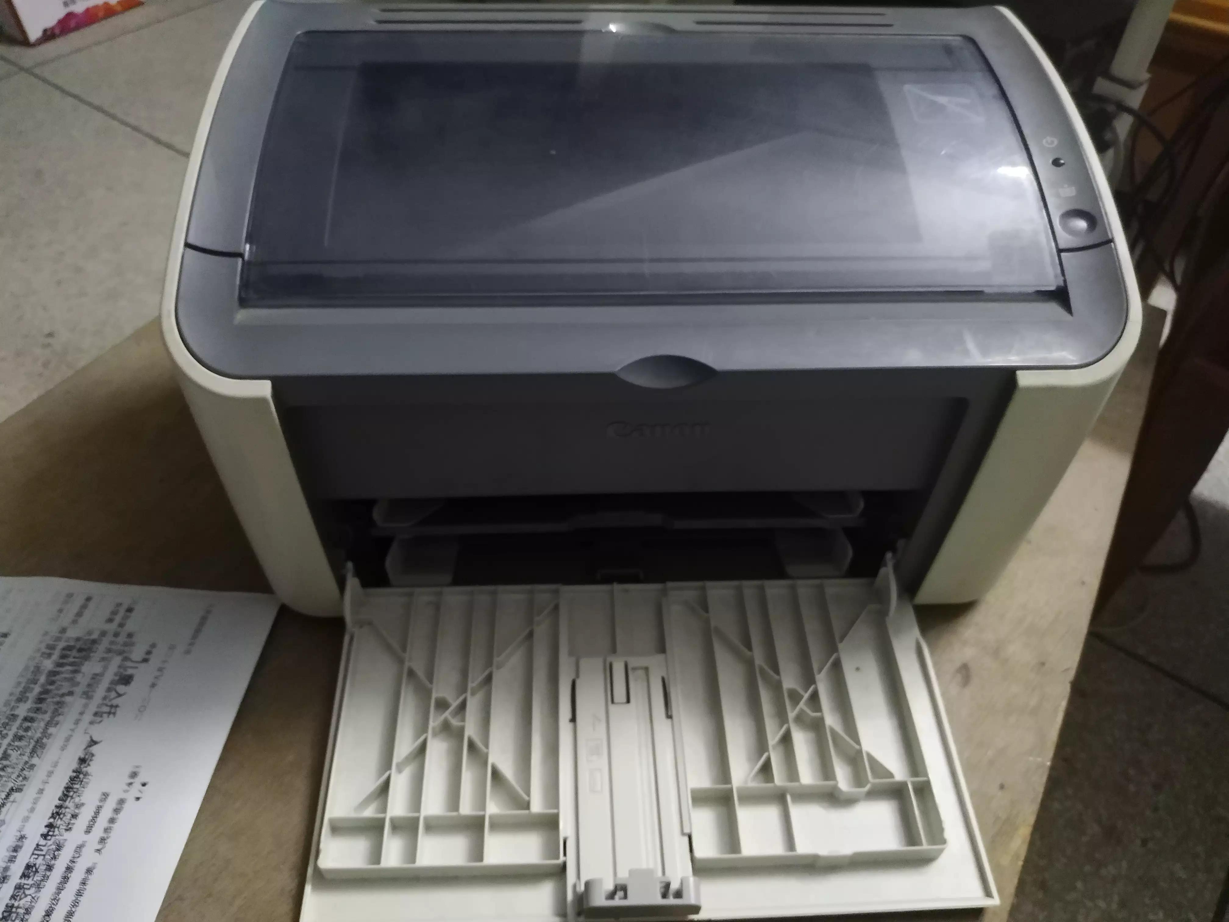 佳能打印机卡纸了怎么把纸拿出来佳能卡纸