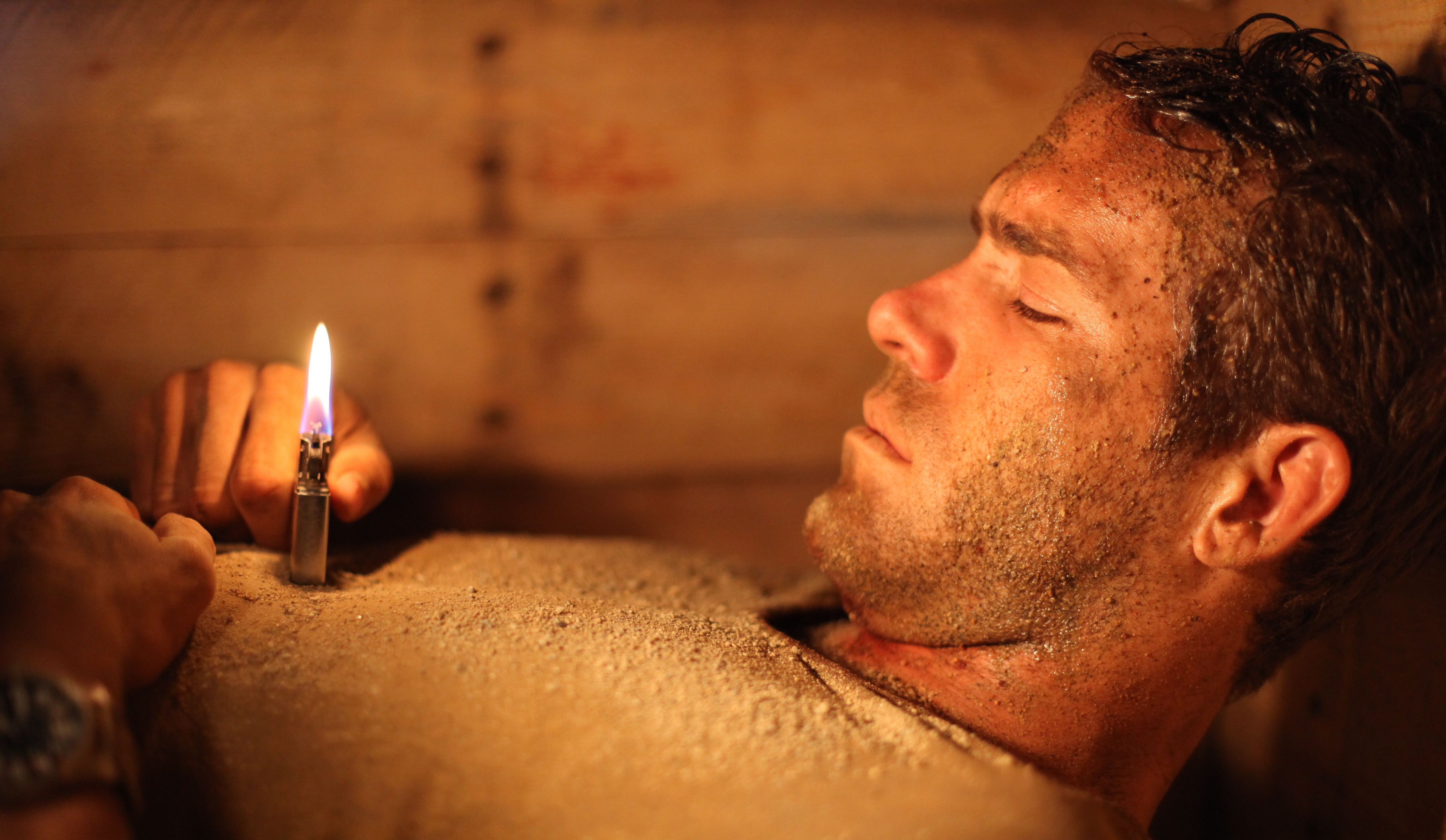 那就是狮门影业公司发行的悬疑惊悚电影——《活埋》.