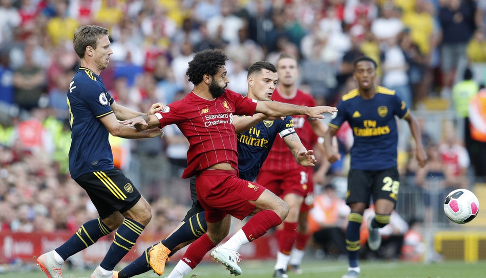 利物浦对阿森纳（英超-萨拉赫两球利物浦3-1阿森纳平纪录 曼联93分钟遭绝杀主场1-2）