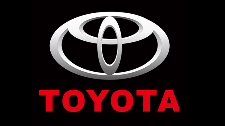 丰田汽车商标图案中,一横一竖的两个椭圆形,组成了丰田英文字母的第一