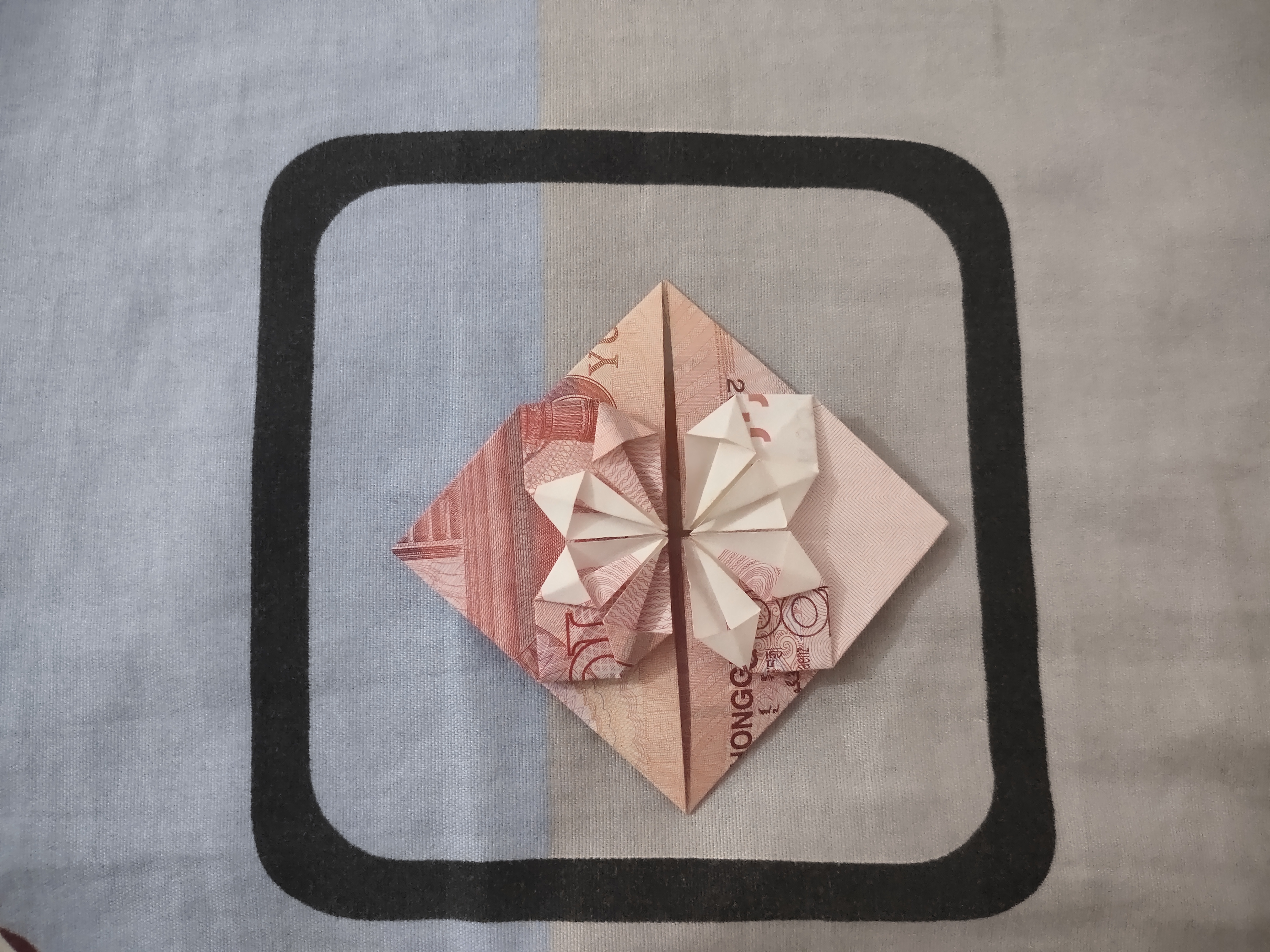 100块钱折爱心 钱怎么折爱心步骤-诚智百科网