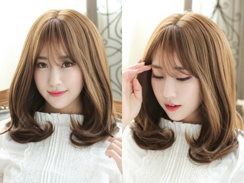 韩式可爱梨花头造型,很有甜美的气质,齐肩的中长发,发尾稍稍内扣修饰