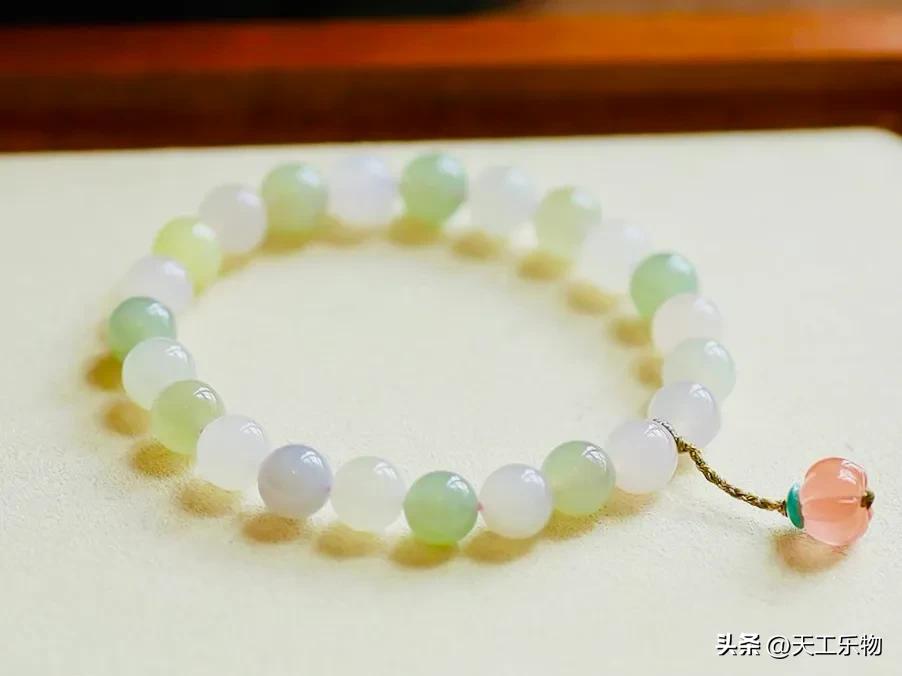 北京奥运会奖牌用什么玉（北京奥运的“金镶玉”奖牌，究竟是不是和田玉？）