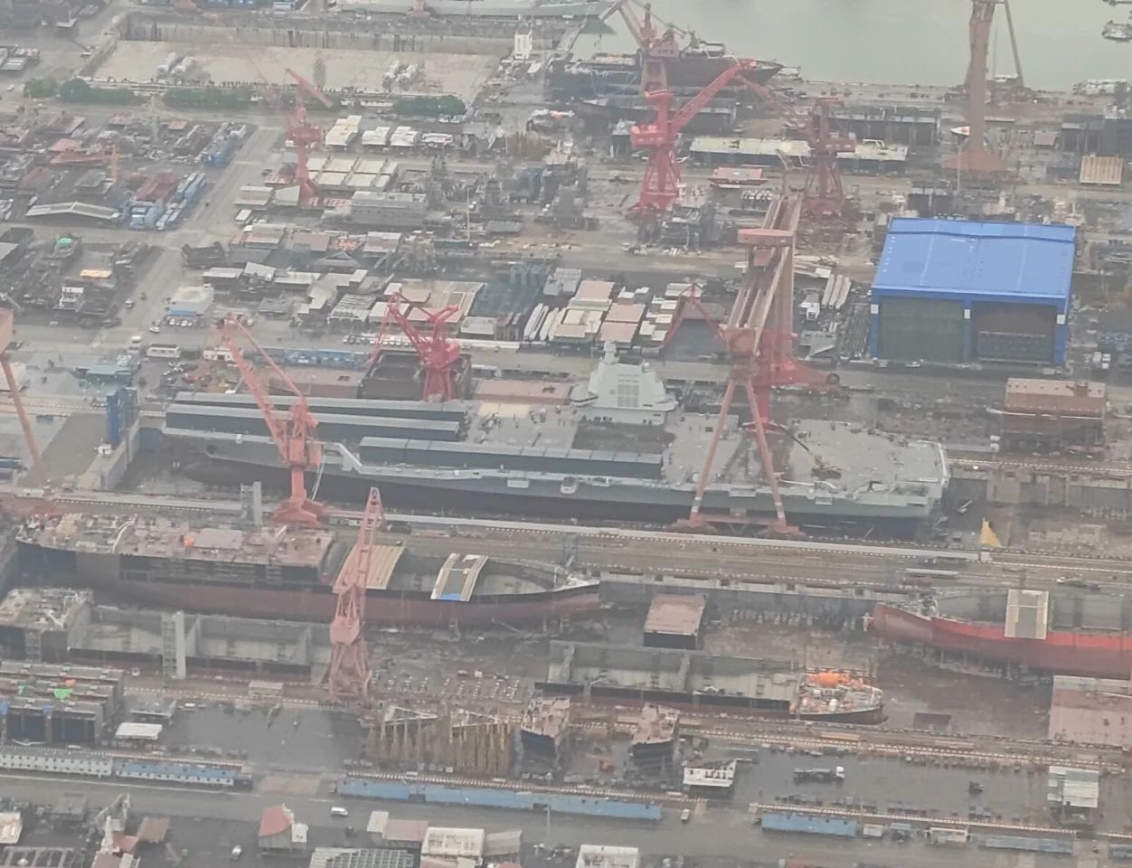 ��ý���й�003���º�ĸ��׼���������⽫���й�����һ���µĿ�ʼ