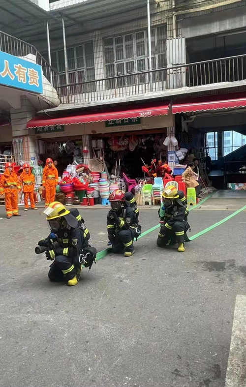 新邵县市场服务中心与消防大队联合组织消防应急演练