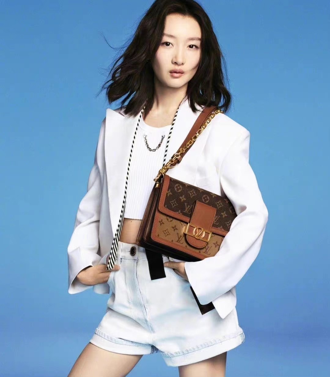 Zhou Dongyu in Louis Vuitton on Vogue China January 2022 cover by Ziqian  Wang - fashionotography