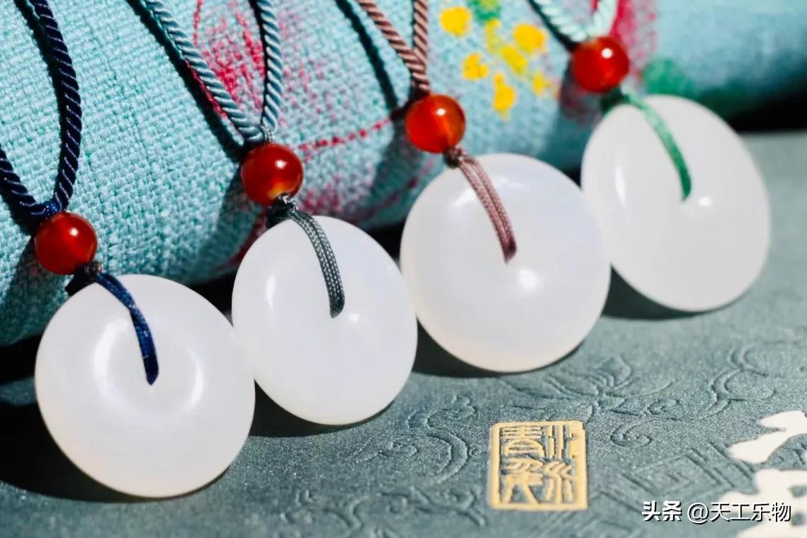 北京奥运会奖牌用什么玉（北京奥运的“金镶玉”奖牌，究竟是不是和田玉？）