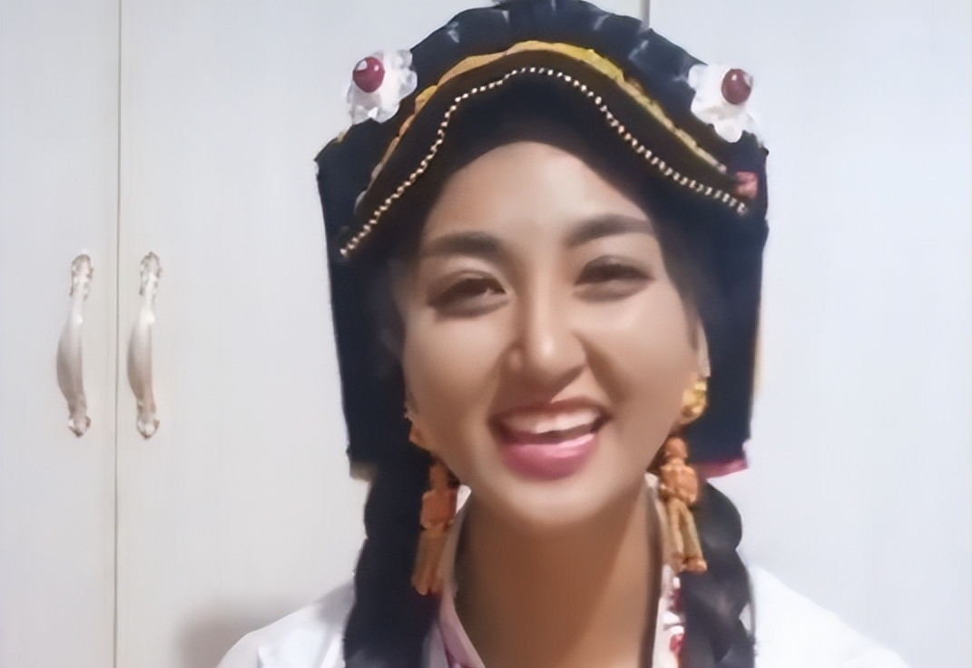 06世界杯拉姆（那個在直播中被前夫縱火燒傷的藏族女孩拉姆，已經去世兩年了）