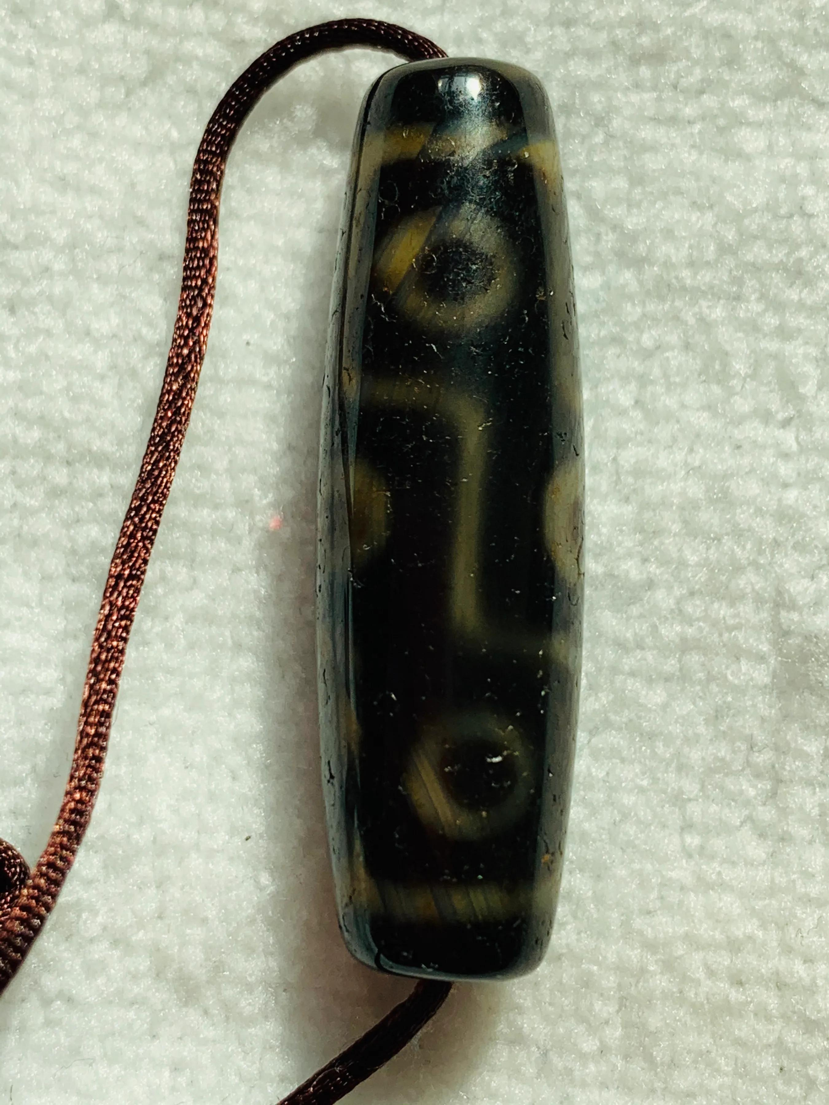 第三篇 天降石象雄天珠重回人间(天珠眼是天然形成的吗)-老玛瑙