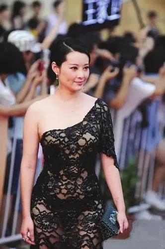 乒乓名將張怡寧老公（13年后再看張怡寧徐威大20歲的盛世婚禮，一兒一女是最好的回應）