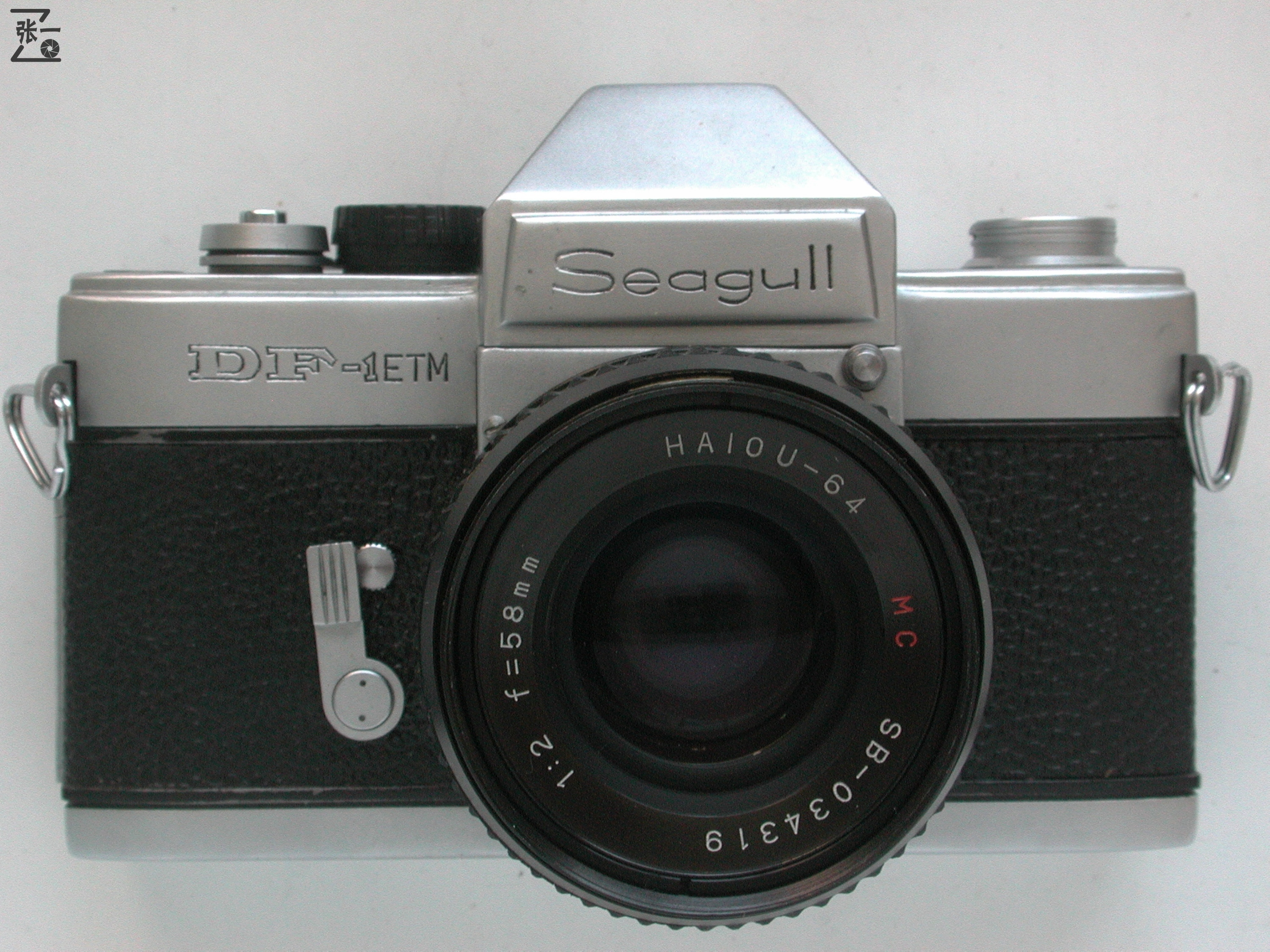 1988年8月,以690元的价格在上海购买到的海鸥df-1etm单反照相机