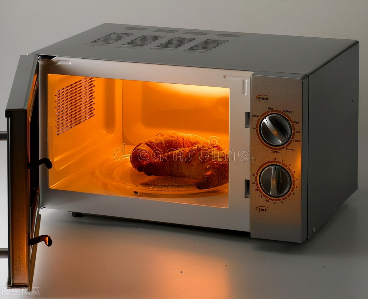 Microwave Oven: A Convenient Kitchen Appliance for Quick Heating and Cooking Meals Efficiently