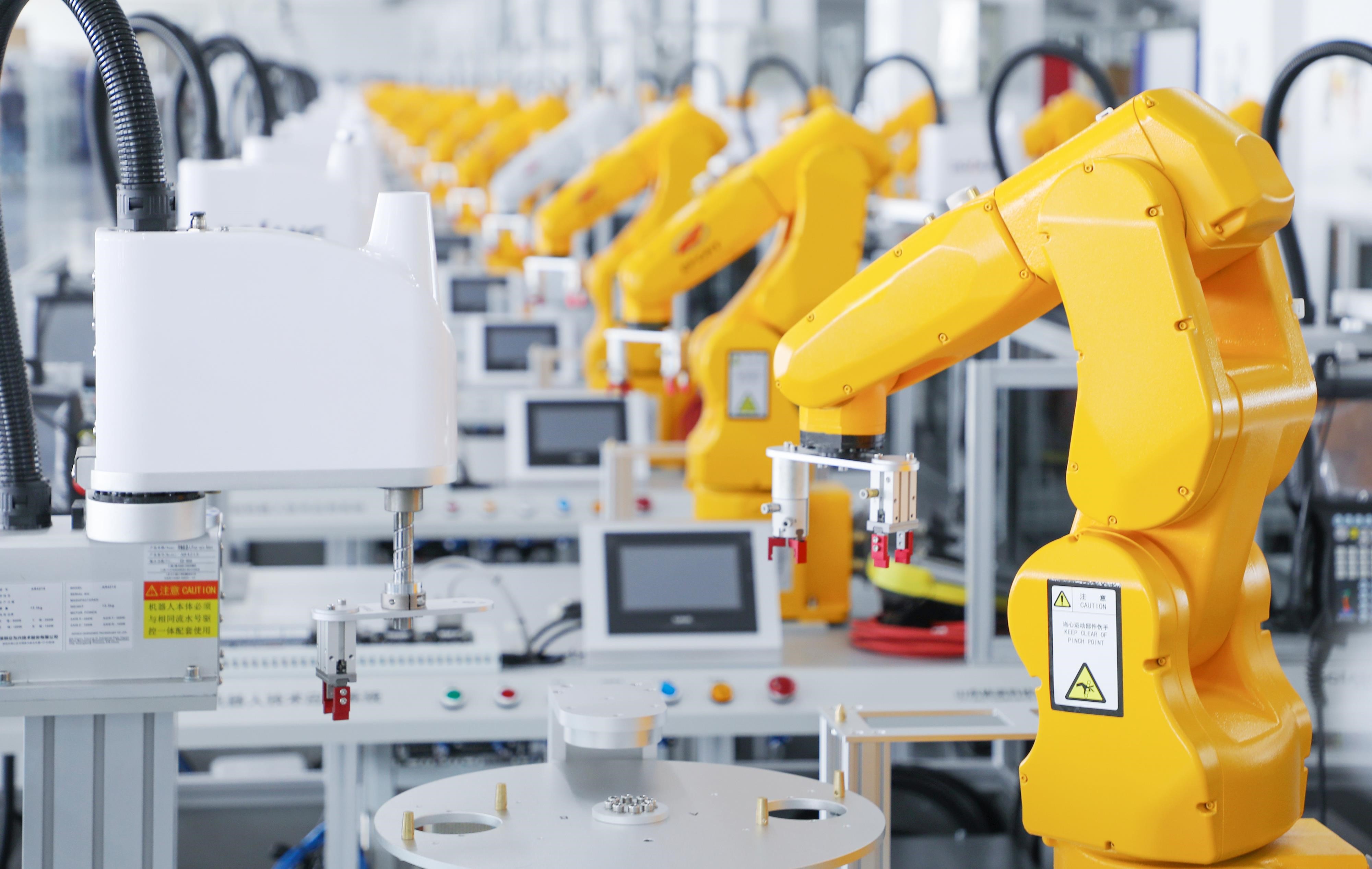 巨能股份主要提供各类机器人自动化生产线,自动化辅助单元和智能工厂