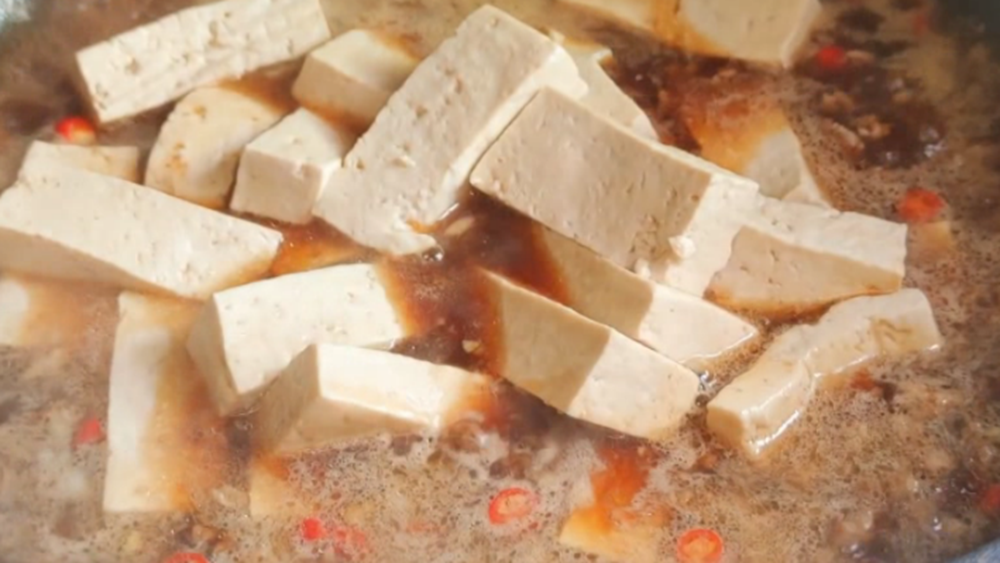 图片[6]-【砂锅豆腐】做法步骤图 营养美味 汤汁拌饭也能吃两碗-起舞食谱网